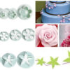 set 33 forme pentru decorat tort si prajituri cup cake cu stelute flori fluturi inimioare si frunze din pvc alb 083883